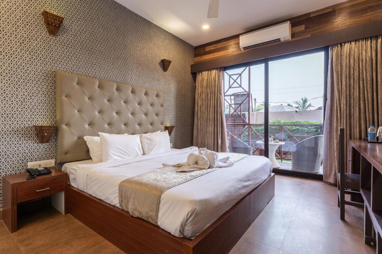 Amara Oceanfront Resort & Club Baga Esterno foto